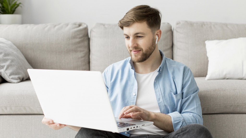 portrait-man-floor-with-laptop.jpg